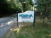 Wegwijzer naar de skihal Montana Snowcenter