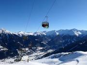 Sendleitenbahn - 4-persoons hogesnelheidsstoeltjeslift (koppelbaar) met kap