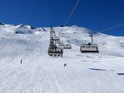 Madrisella Bahn - 6-persoons hogesnelheidsstoeltjeslift (koppelbaar) met kap en stoelverwarming