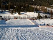 Brede en gemakkelijke piste naar het dalstation