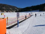 Tovermat in het oefengebied - daarnaast de sleeplift