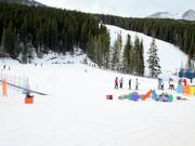 Beginnersgebied met transportbanden direct bij het dalstation