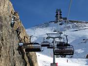 Lange Wandbahn - 6-persoons hogesnelheidsstoeltjeslift (koppelbaar) met kap en stoelverwarming