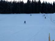 Uitzicht op de lichte piste