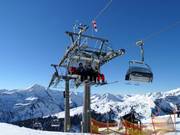 Uga-Express - 4-persoons hogesnelheidsstoeltjeslift (koppelbaar) met kap