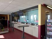 Verzorgde kassa bij het dalstation