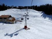 Schönried-Horneggli - 3-persoons hogesnelheidsstoeltjeslift (koppelbaar) met kap