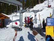 Hulp bij het instappen bij de stoeltjeslift