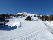 Lichte en brede piste