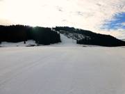 Uitzicht over de langste afdaling in het skigebied