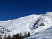 Diepe sneeuwhellingen Mottolino