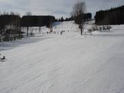 Brede en gemakkelijke pistes aan de achterkant