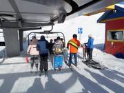 Vriendelijke begroeting bij de stoeltjeslift