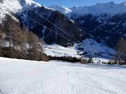 Piste nr. 18 met zespersoons stoeltjeslift Glocknerblick