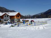 Kinderdraaimolen bij het dalstation in Pichl
