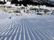 Perfecte pistepreparatie in het skigebied van Lermoos