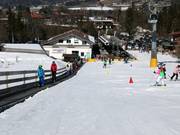 Transportband bij het dalstation van de gondelbaan