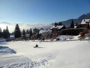 Gratis rodelbaan in Villars met eigen transportband