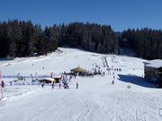 Schatzberg Zwergenland: Transportband, skischoolterrein en gemakkelijke piste