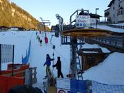 Hulp bij het instappen bij de sleeplift