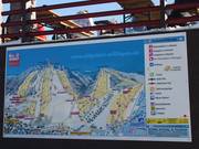 Grote borden bij de dalstations