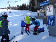 Hulp bij het instappen in de sleeplift