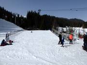 Oefenhelling met transportband in Laax
