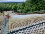 Zwarte piste 3, die uitkomt op de rode piste 2