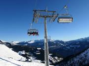 Unterbergalmbahn - 6-persoons hogesnelheidsstoeltjeslift (koppelbaar) met kap