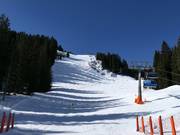Piste en skiroute bij de stoeltjeslift Sunnegg
