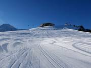 Brede afdaling naar de Arzjochbahn