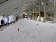 Beginnerspiste met transportband