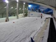 Beginnerspiste met transportband