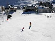 Beginnersgebied bij de Startbaan (stoeltjeslift en tovertapijt)