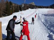 Hulp bij het instappen bij de sleeplift