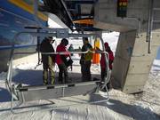 Hulp bij het instappen bij de stoeltjeslift