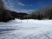 Gemakkelijke en brede piste in het skigebied Le Mont Grand-Fonds