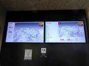 Informatiebord in het dal bij het begin van het skigebied