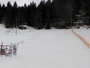 Beginnerspiste bij de oefenlift