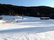 Gemakkelijke piste bij de skilift in Trins