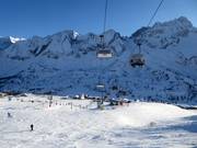 Een typische vierpersoons stoeltjeslift in het skigebied