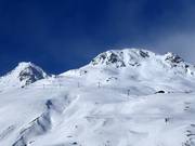 Uitzicht op de bovenste pistes bij de Wilden Mannle