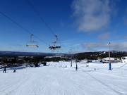 Piste en stoeltjeslift direct bij het vakantiepark Idre Fjäll