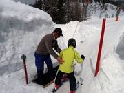 Hulp bij het instappen bij de sleeplift